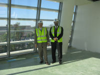 NCEP Director Louis Uccellini and OCWWS Director David Caldwell inspect the NCEP Director's office area
