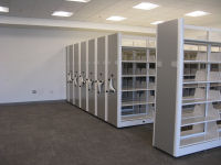 Space saving shelves in library.