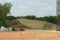 Bulldozers move dirt around.