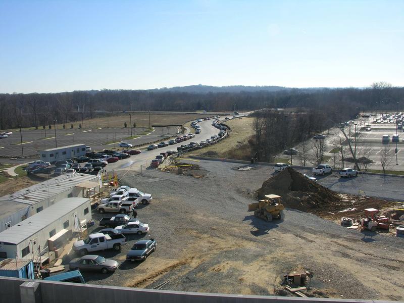 View towards entrance road and River Road from the top deck of the parking garage.