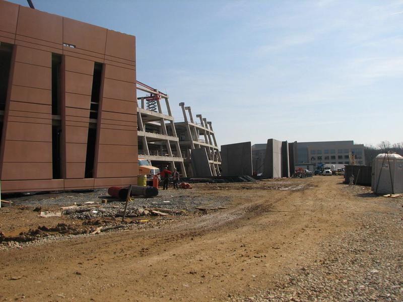View towards the east along the front of NCWCP showing the data center, the front entrance and the auditorium. The UMD building is in the background.
