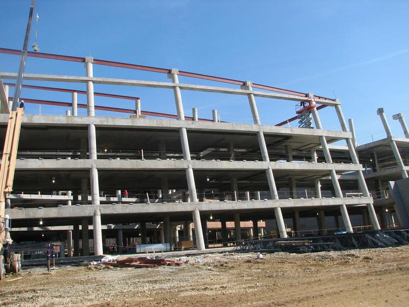 View of front entrance showing newly installed roof girders