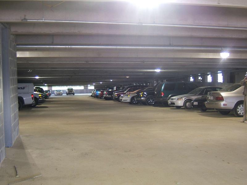 Parking garage gets tested with the cars of the construction workers