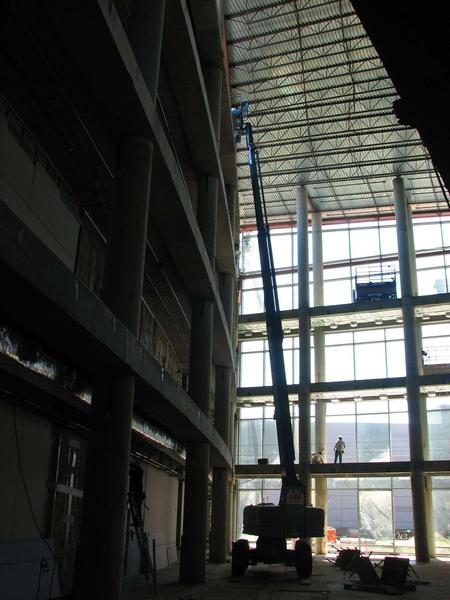 Crane in atrium to allow work on roof area