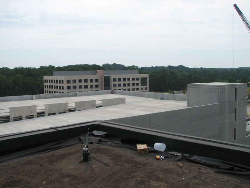 View from the roof southeast, with the parking garage in the foreground and UMD's Earth System Science Interdisciplinary Center in the background