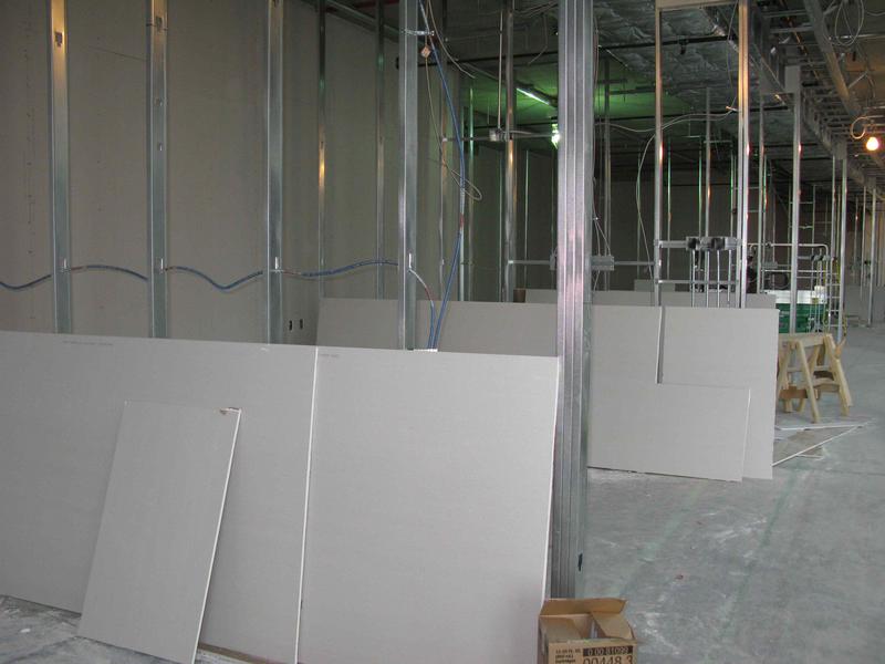 Drywalling conference rooms on the third floor