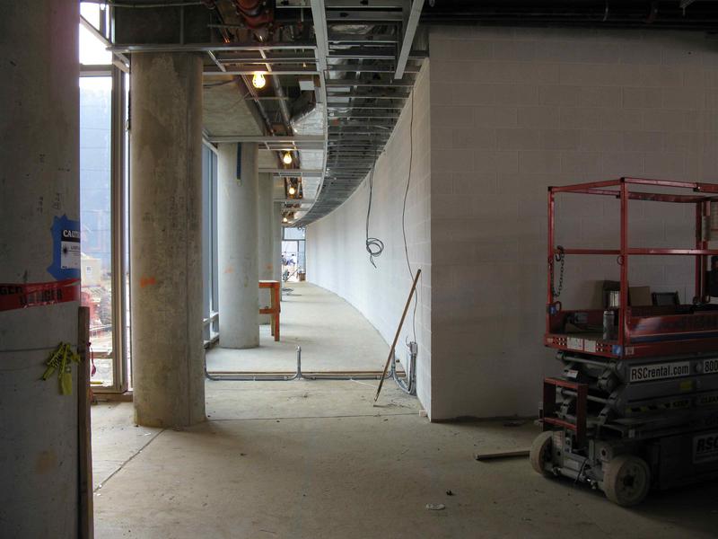Hallway through which employees may enter from the parking garage