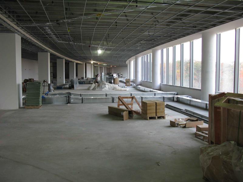 Heating/colling vents laid out under the raised flooring on the fourth floor ops area