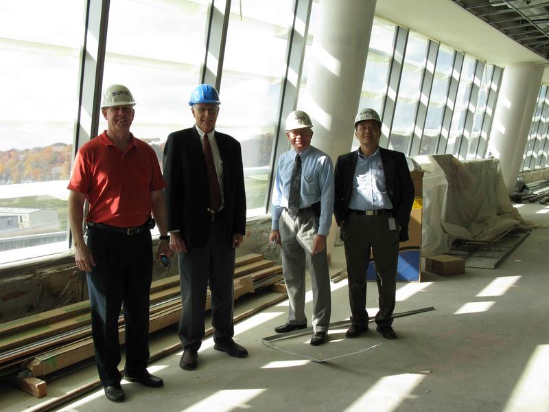 HPC/OPC staff look over their new digs: left to right, Kevin McCarthy, Dave Feit, Jim Hoke and Ming Ji