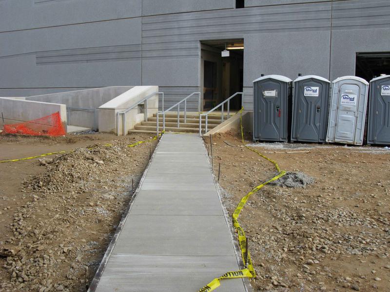 Sidewalk between parking garage and conference center/auditorium