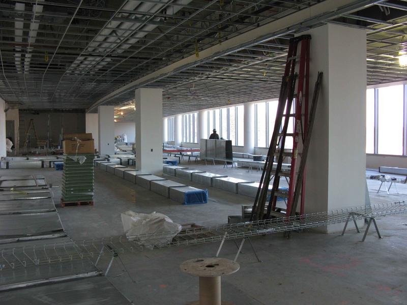 Fourth floor ops area. Duct work will be below raised floor when it is installed