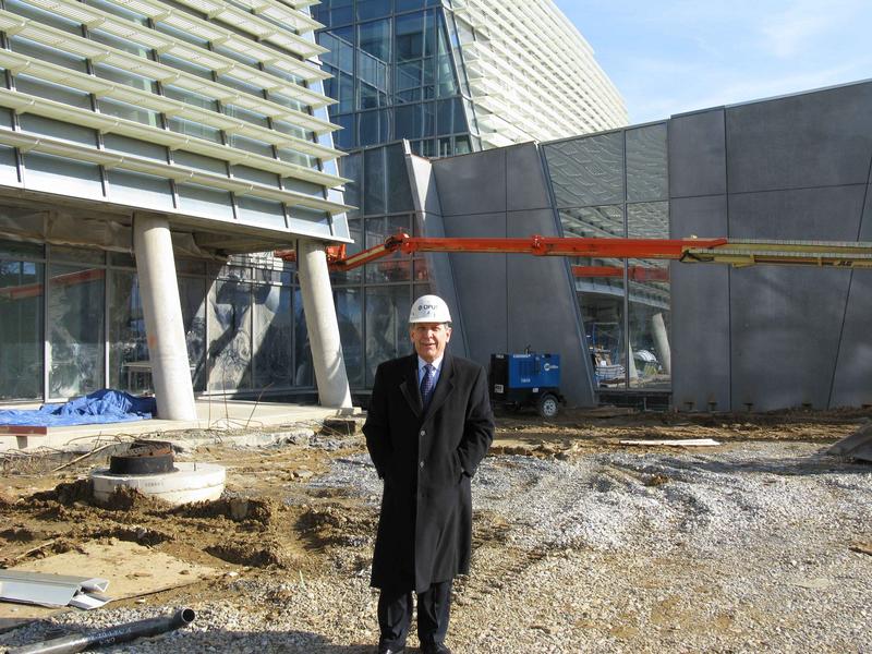 Dr. Uccellini at main entrance to NCWCP. The Auditorium is to the right.