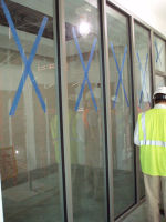 Sheetrock and glass walls are being installed in some offices and conference rooms.