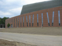 Front of the building, view toward the loading dock and emergency generators.