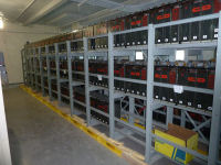 One of the battery rooms that contain the hundreds of batteries used in case of a power outage; these batteries maintain operational equipment until the emergency generators engage. 
