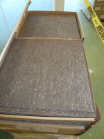 An open box of carpet tiles gives a hint of what our floors will look like! 
