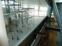 A view from the 5th floor HVAC room into the Atrium, the wood platform seen in a previous image is located at the 4th floor. 

