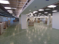A view on the 2nd floor looking westward, into the JSCDA (left of the pillars) and the EMC area. 
