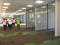 Second floor offices in NESDIS STAR front office area. Note safety equipment required to be worn by all visitors.