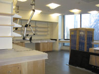 First floor lab area with cabinetry installed.
