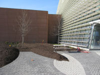 Closer view of paving and landscaping of front entrance.