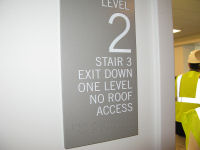 Example of stairwell signs identifying floors.